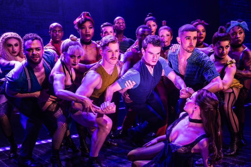 Jay Armstrong Johnson, Arianna Rosario and the company of the 2025 touring production of MOULIN ROUGE! THE MUSICAL. Photo by Matthew Murphy and Evan Zimmerman for MurphyMade 