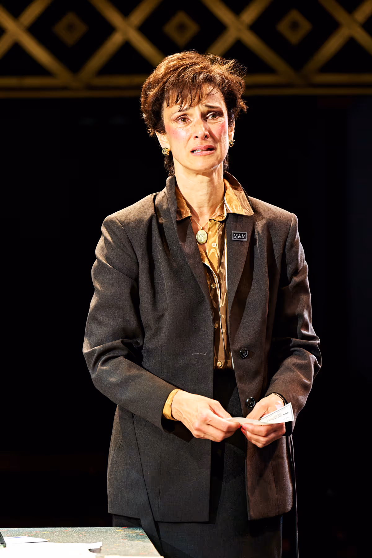 Indira Varma (Levene) in Glengarry Glen Ross at The Old Vic (2026). Photo by Manuel Harla at Photos: All-Female GLENGARRY GLEN ROSS at The Old Vic