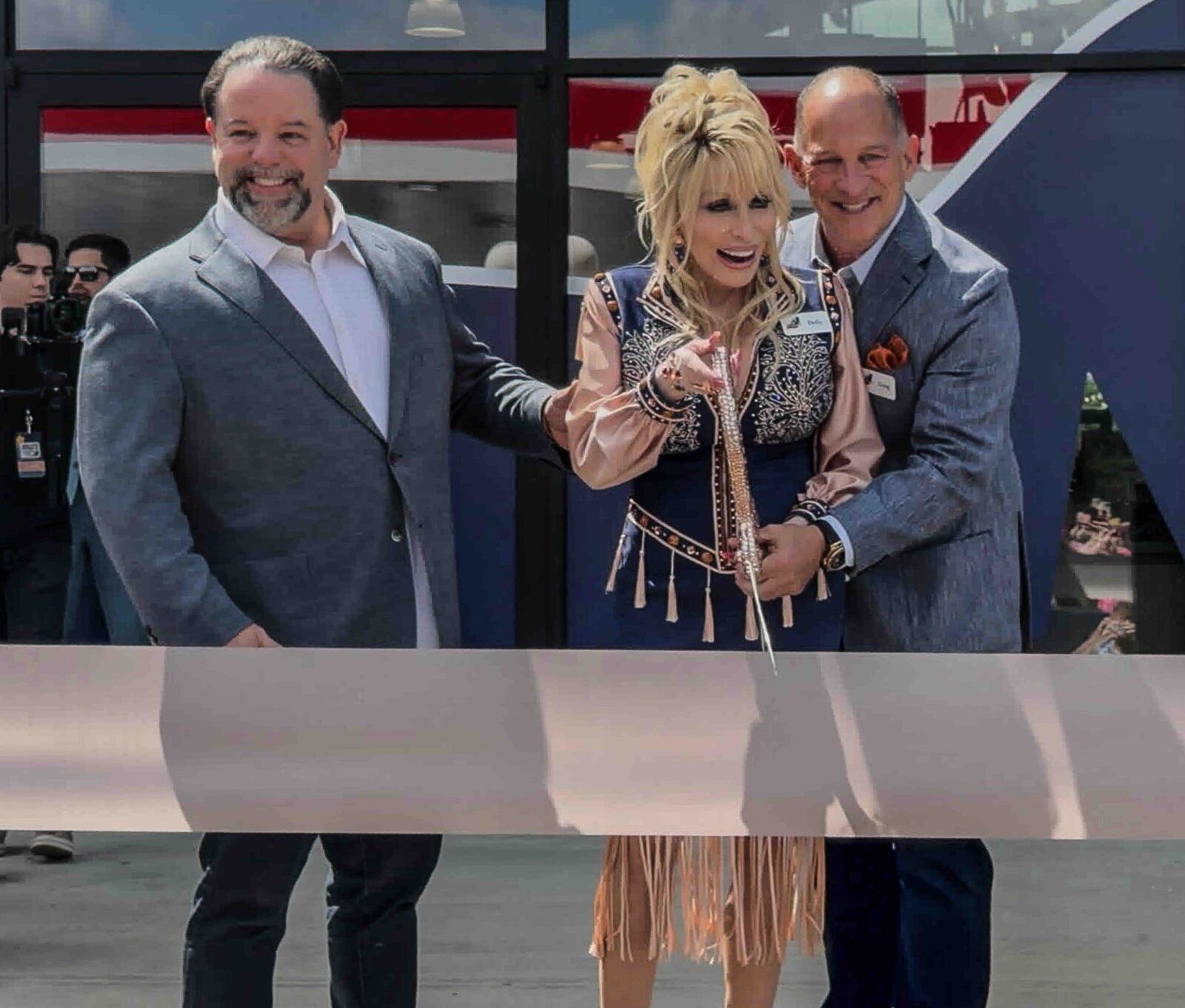 Photos: Dolly Parton Makes Surprise Appearance at Grand Opening of Dolly's Tennessean Travel Stop Image