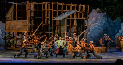 Joan Almedilla (center) and members of the company Photo