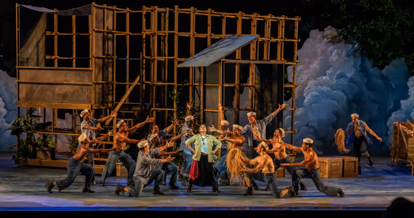 Joan Almedilla (center) and members of the company Photo