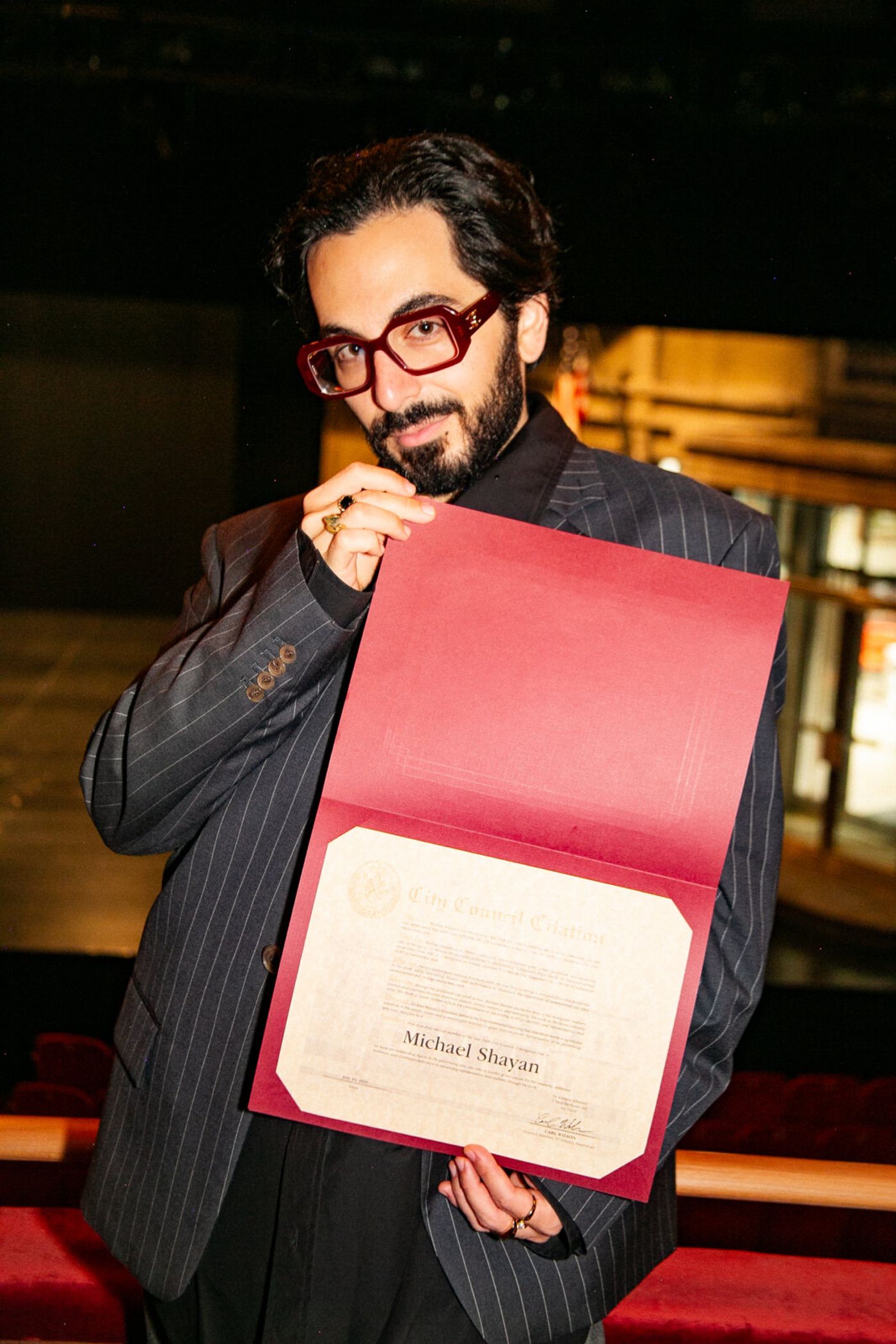 DOG DAY AFTERNOON's Michael Shayan Honored By NYC Council Member Carl Wilson Image