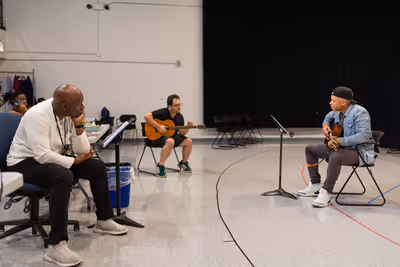 Director Kenny Leon, guitar coach Jack Morsovillo and ensemble member Glenn Davis Photo