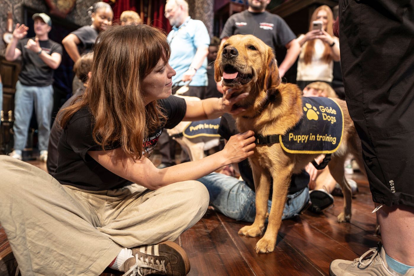 Photos: THE PLAY THAT GOES WRONG Cast Hosts Guide Dogs UK Puppies at Duchess Theatre Image