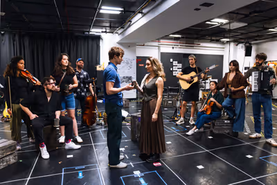 Andrew Durand and Kelsee Kimmel (center) and the company Photo