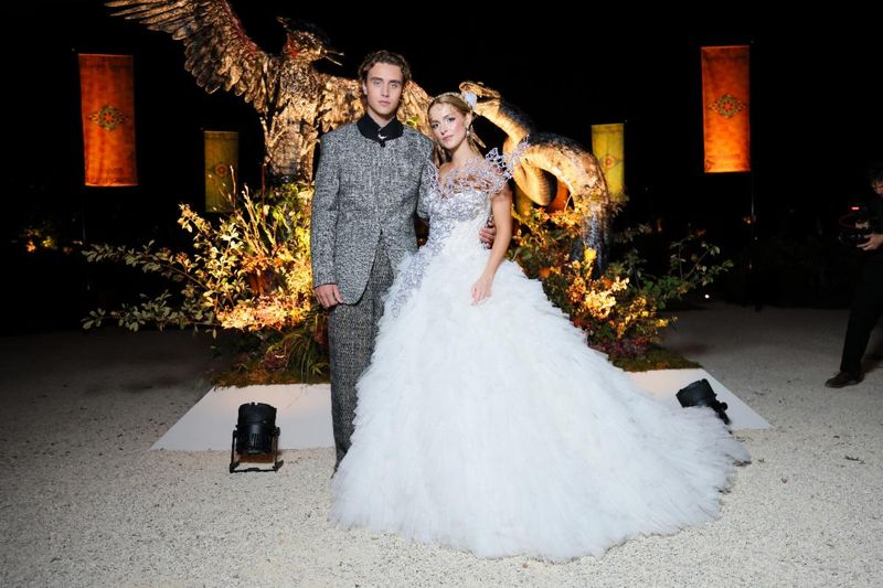 Photos: THE HUNGER GAMES: SUNRISE ON THE REAPING Stars Attend Paris Fashion Exhibition — photo 1 of 8