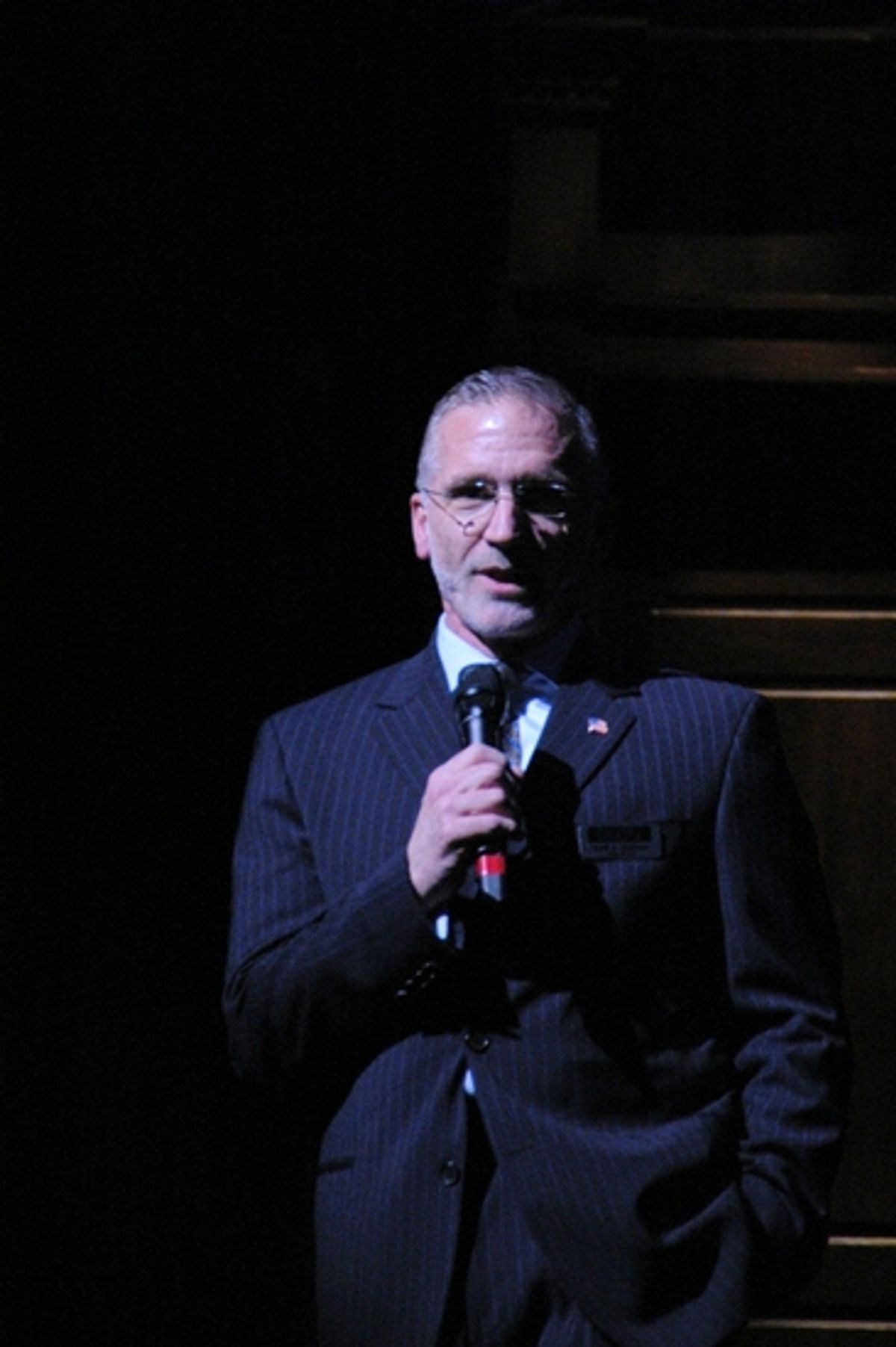 Mark S. Hoebee introduces the show at 