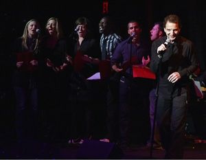 Euan Morton and ensemble Photo