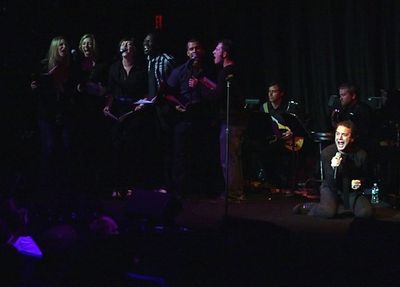 Euan Morton and ensemble Photo