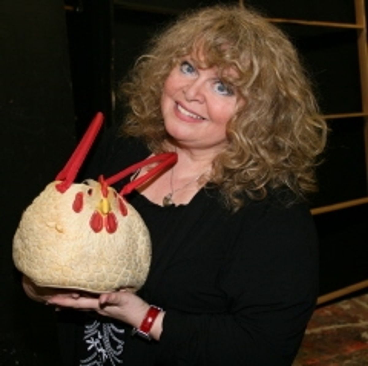 Sally Struthers with her chicken purse at 