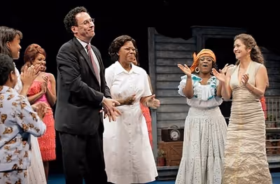 Tony Kushner (book and lyrics), Greta Oglesby (Caroline Thibodeaux), Jamecia Bennett  Photo