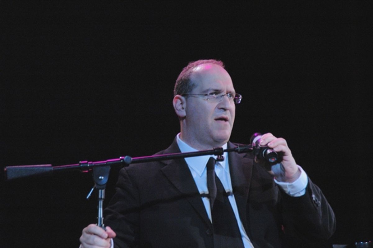 Neil Berg thanking the audience for being part of the fundraiser at 