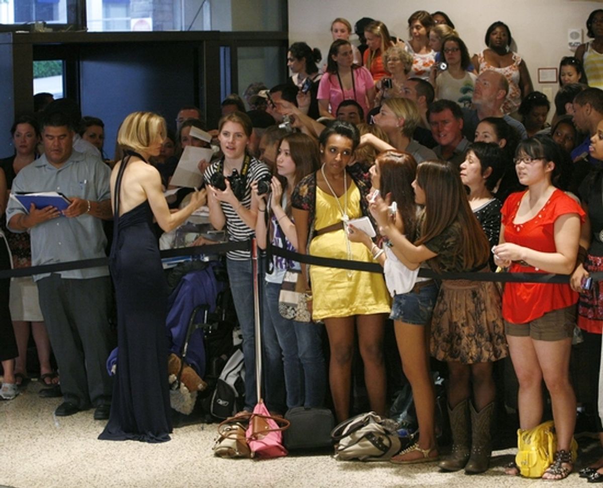 Felicity Huffman greets the crowd at 