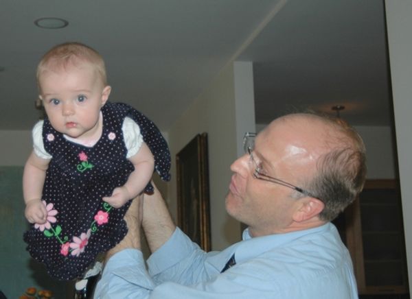 Ellie Felice Seegmiller and her Dad Travis Seegmiller have come to watch her mom sing Photo