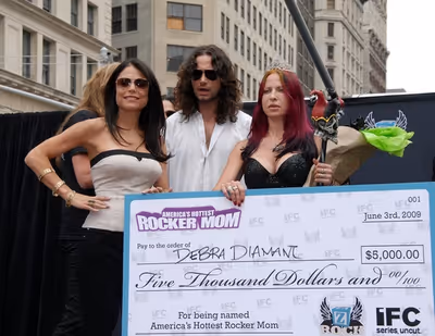Bethenny Frankel and Constantine Maroulis rock on! Photo