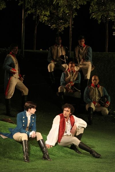 Anne Hathaway, Raul Esparz,a and the company Photo