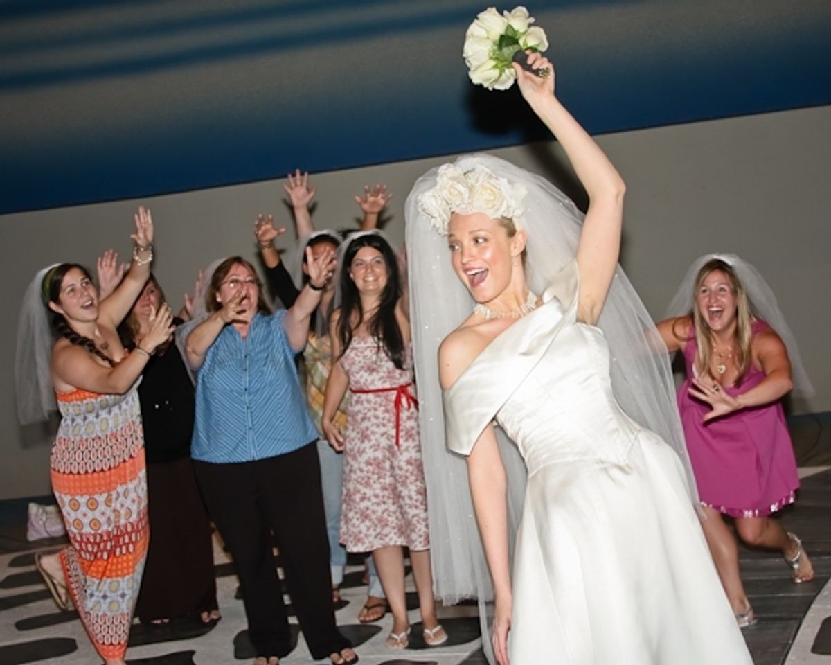 The ladies await the bouquet from Brandi Burkhardt at 