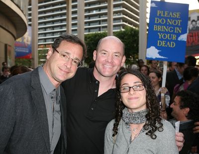 Bob Saget and David Koechner with guest

 Photo