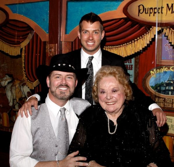 B. Harlan Boll and Matt Patton with Rose Marie Photo