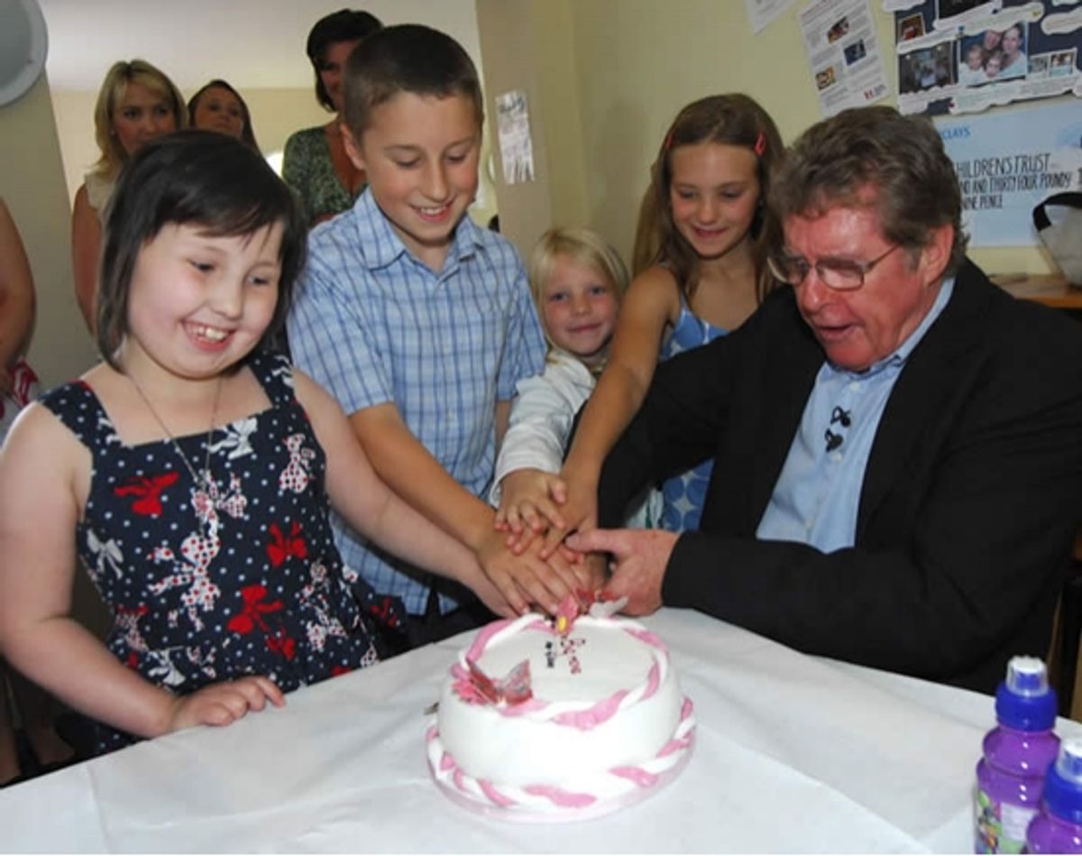 Michael Crawford and the children cut the cake! at 
