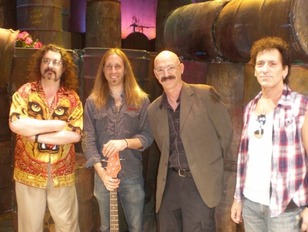Doug Katsaros (keyboards/conductor), Dan Grennes (bass guitar), Tony Levin, Alan Chil Photo