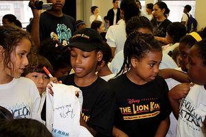 Jeremy Gumbs and Cypress Eden Smith meet the kids and sign autographs Photo