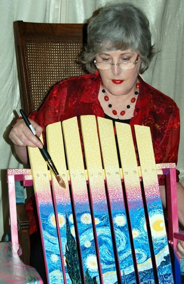 Artist Portia A. Bell, seen here with her Starry Night Rocker, has donated this work… Photo