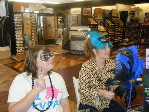 Stephanie Murphy (l) and KVPAC Board Benefit Chairperson, Teresa Kennedy, sell masks  Photo