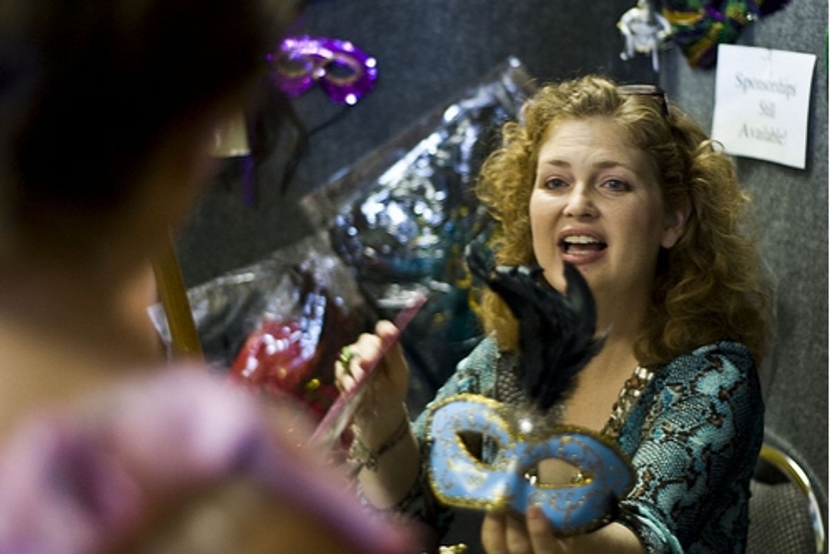 KVPAC's Board Benefit Chairperson and VP of Fund-raising, Teresa Kennedy, sells masks and sponsorships for the Masquerade & Martini Mixer on September 17, 2009. Table sponsorships are $500 and are tax at 