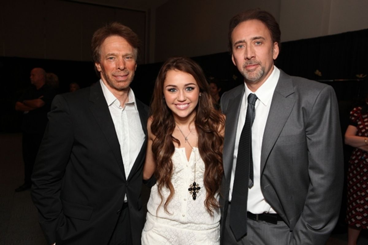 Producer Jerry Bruckheimer, Miley Cyrus and Nicolas Cage at 