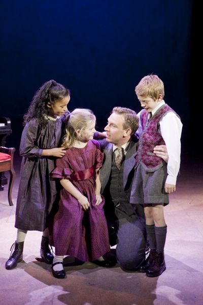George Bailey (Paul Thornley) with his children Photo