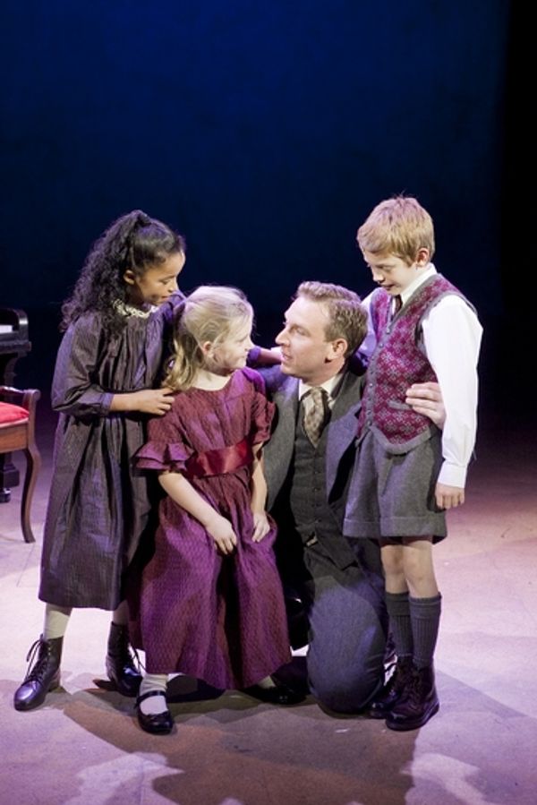 George Bailey (Paul Thornley) with his children Photo