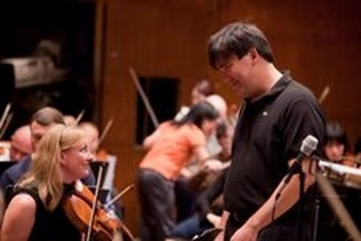 Music Director Alan Gilbert shares a moment with Principal Viola Cynthia Phelps before the start of the Free Dress Rehearsal. at New York Philharmonic Launches '09-'10 Season