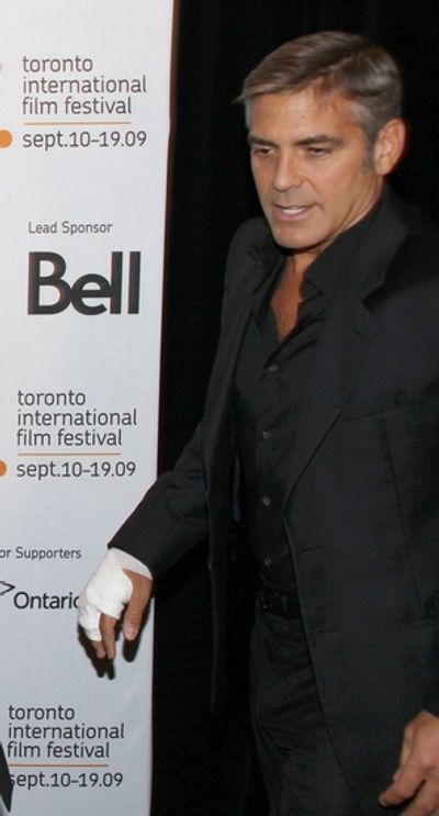 The Press Conference begins as George Clooney arrives! Photo