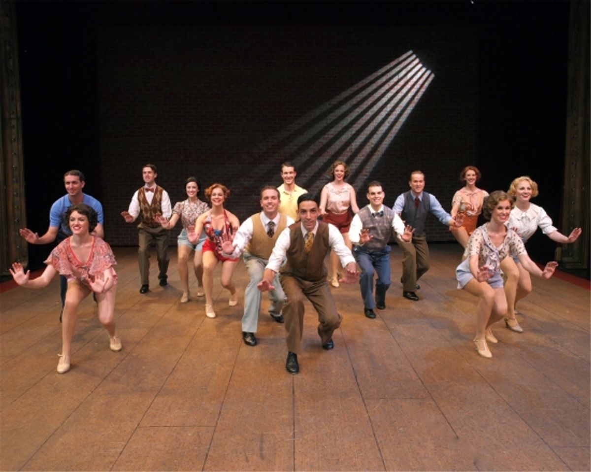 Derek Roland (center) and the ensemble at 