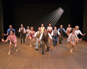 Derek Roland (center) and the ensemble Photo