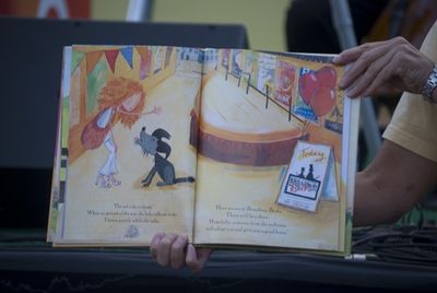 Bernadette Peters reads Broadway Barks Photo