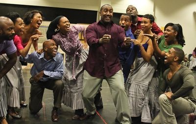 Quentin Earl Darrington and the ensemble Photo