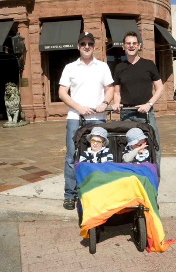 Patrick Bangl and Michael DeSanis with their twins sons, Nick and Alex Photo