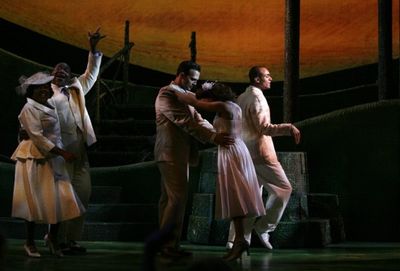 Cheyenne Jackson and the cast dance off as the curtain comes down on Opening Night! Photo