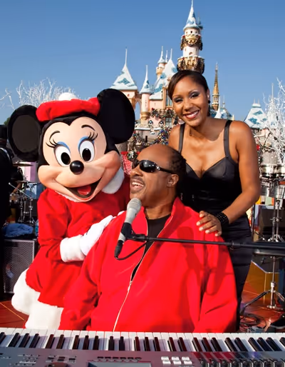 Minnie Mouse, Stevie Wonder and his daughter, Aisha Morris Photo