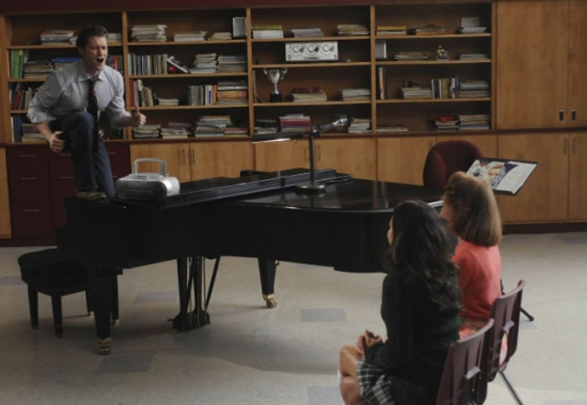 Will (Matthew Morrison, L) sings a song to Rachel (Lea Michele, C) as Emma (Jayma Mays, R) watches at 