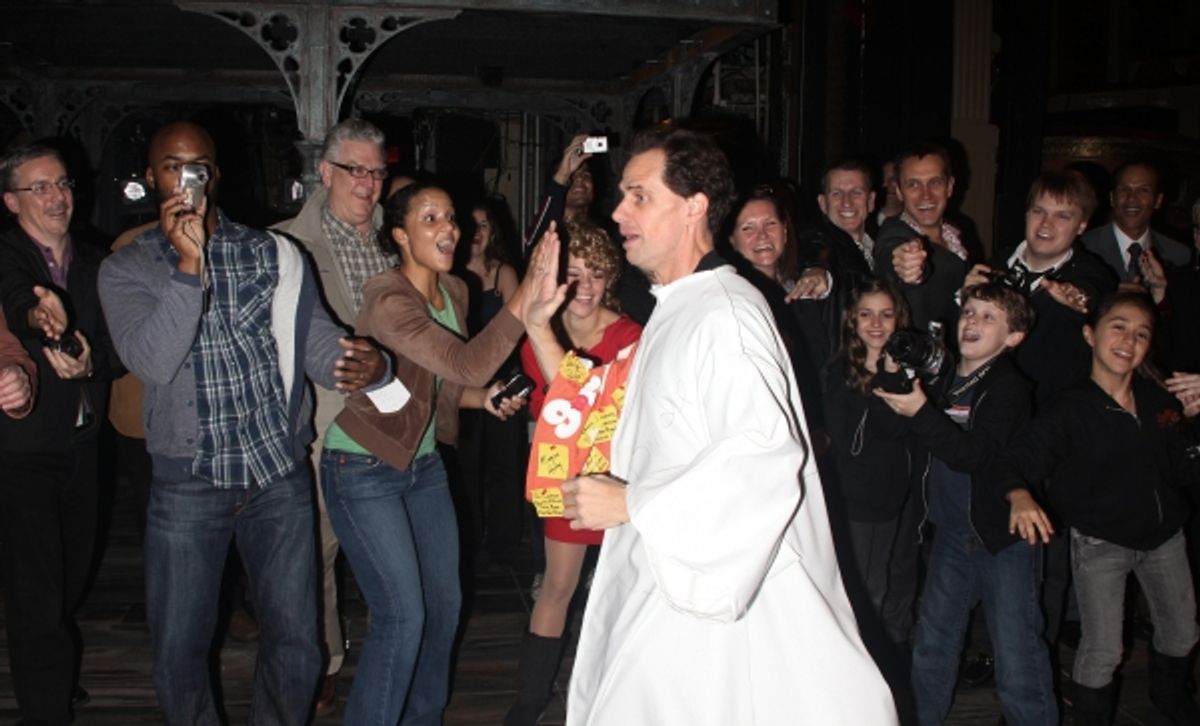 Stephanie Umoh and the company embrace the new Gypsy Robe wearer Michael X. Martin at 