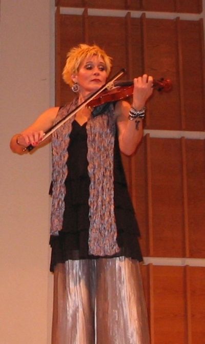 Sylvia McNair plays the violin Photo