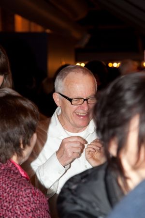 Eric Peterson mingles with the guests Photo