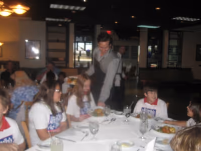 Phantom Andrew Ragone serving the After School All Stars Photo