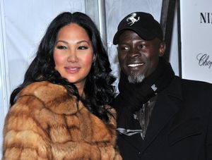  Designer Kimora Lee Simmon & Djimon Hounsou  Photo
