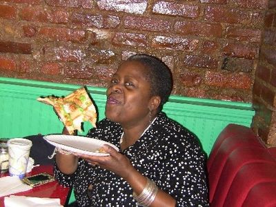 Lillias White enjoys "The Zombie" slice. Photo