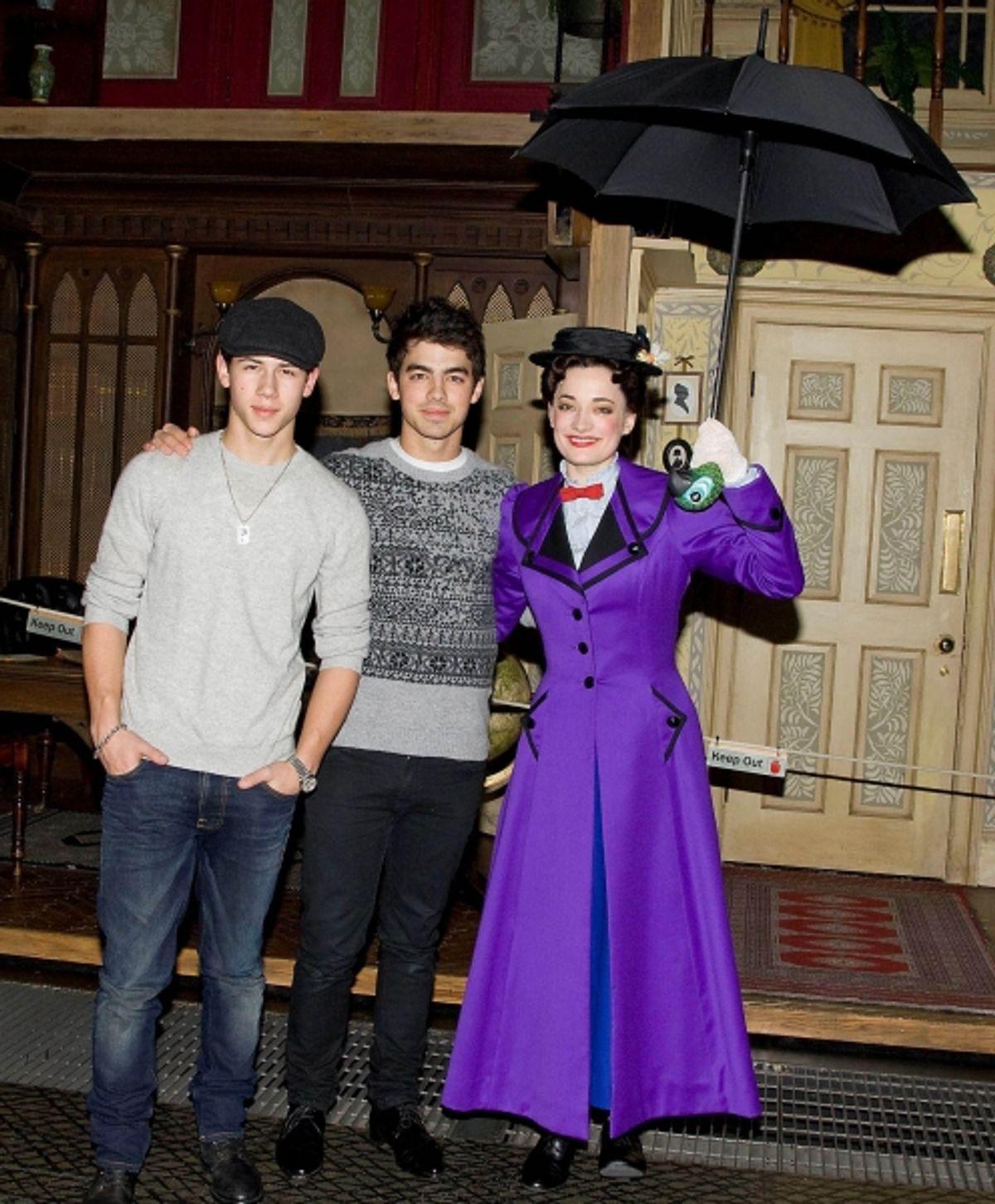 Nick Jonas, Joe Jonas, and Laura Michelle Kelly at 