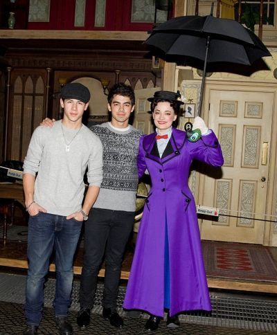 Nick Jonas, Joe Jonas, and Laura Michelle Kelly Photo